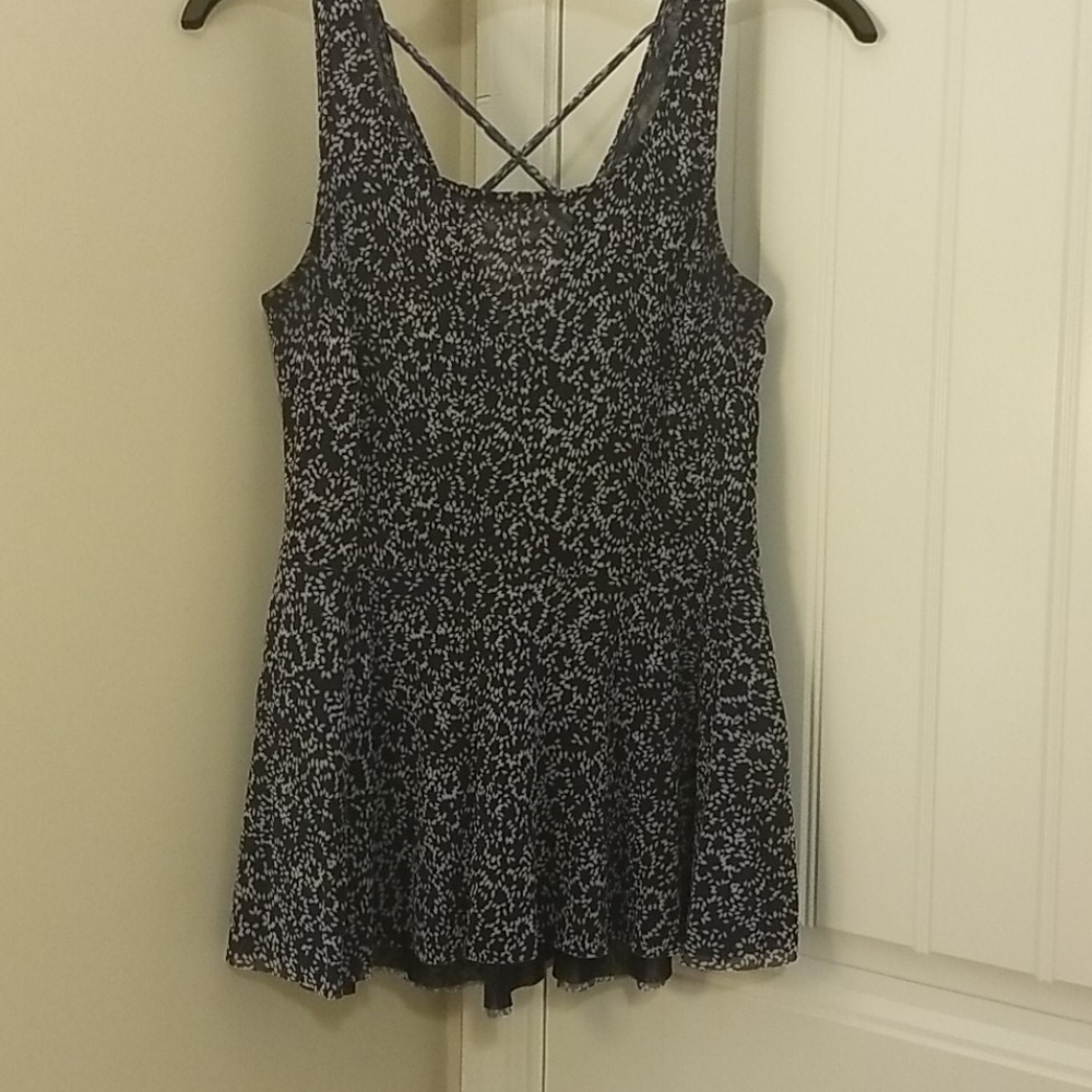 Peplum top with detail cross back